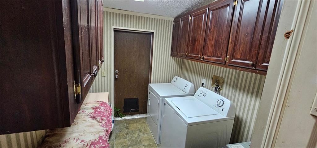 944 Lite-N-Tie Road Macon, GA 31211 - Photo 20 of 36 a utility room with dryer and washer