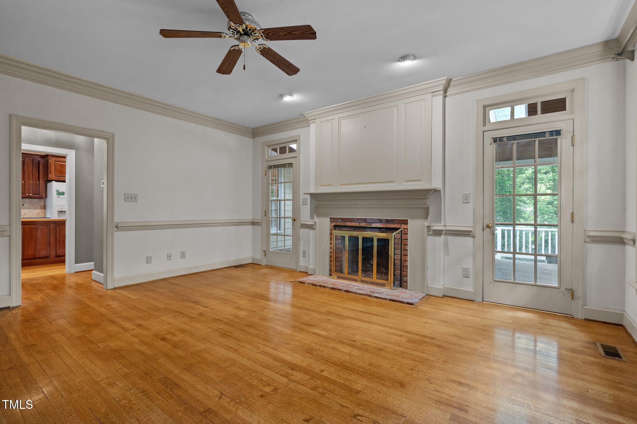 2113 Fallon Oaks Court Raleigh, NC 27608 - Photo 10 of 23 Living Rm/Den with Fp