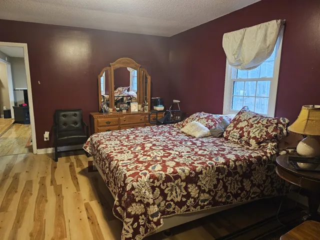 a bathroom with a sink vanity and mirror