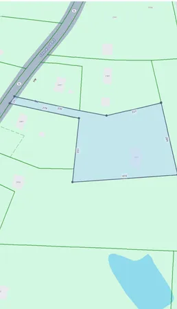 a room with wooden floor and furniture