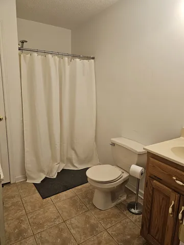 a balcony with wooden floor