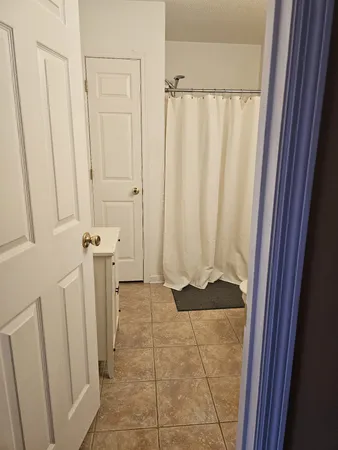 a view of a chairs and table on the wooden floor