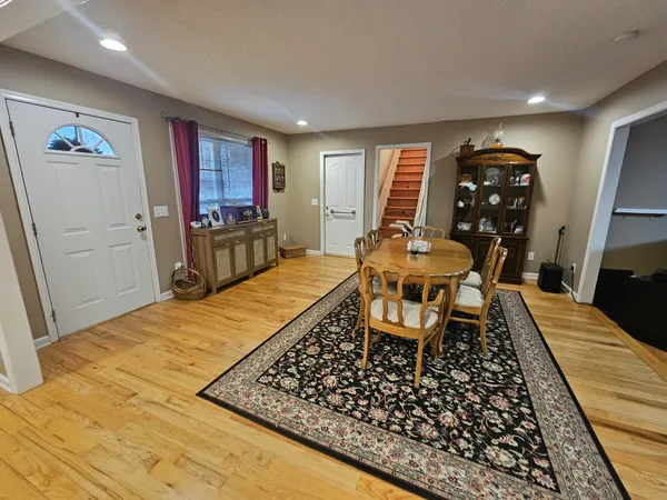 a view of a dining room with furniture