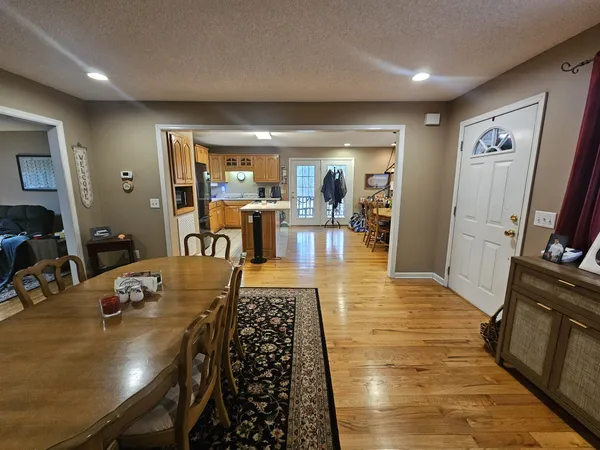 a view of a dining room with furniture
