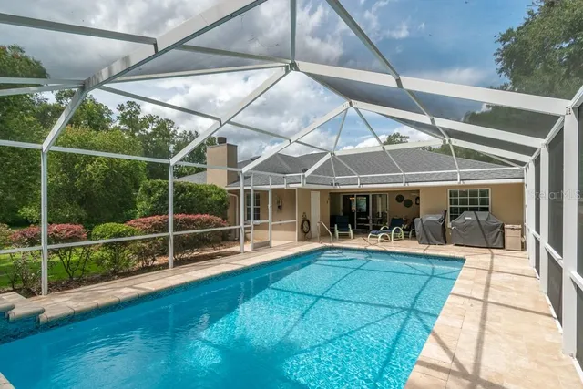 a view of a livingroom with furniture and window