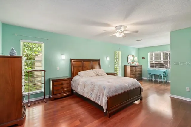 a bathroom with a shower sink double and mirror