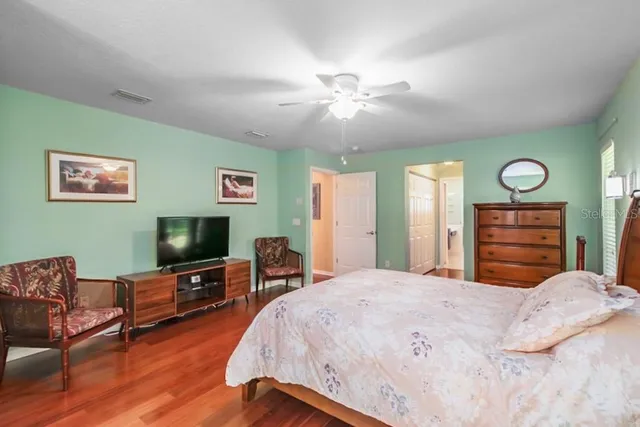 a dining room with furniture and a kitchen view
