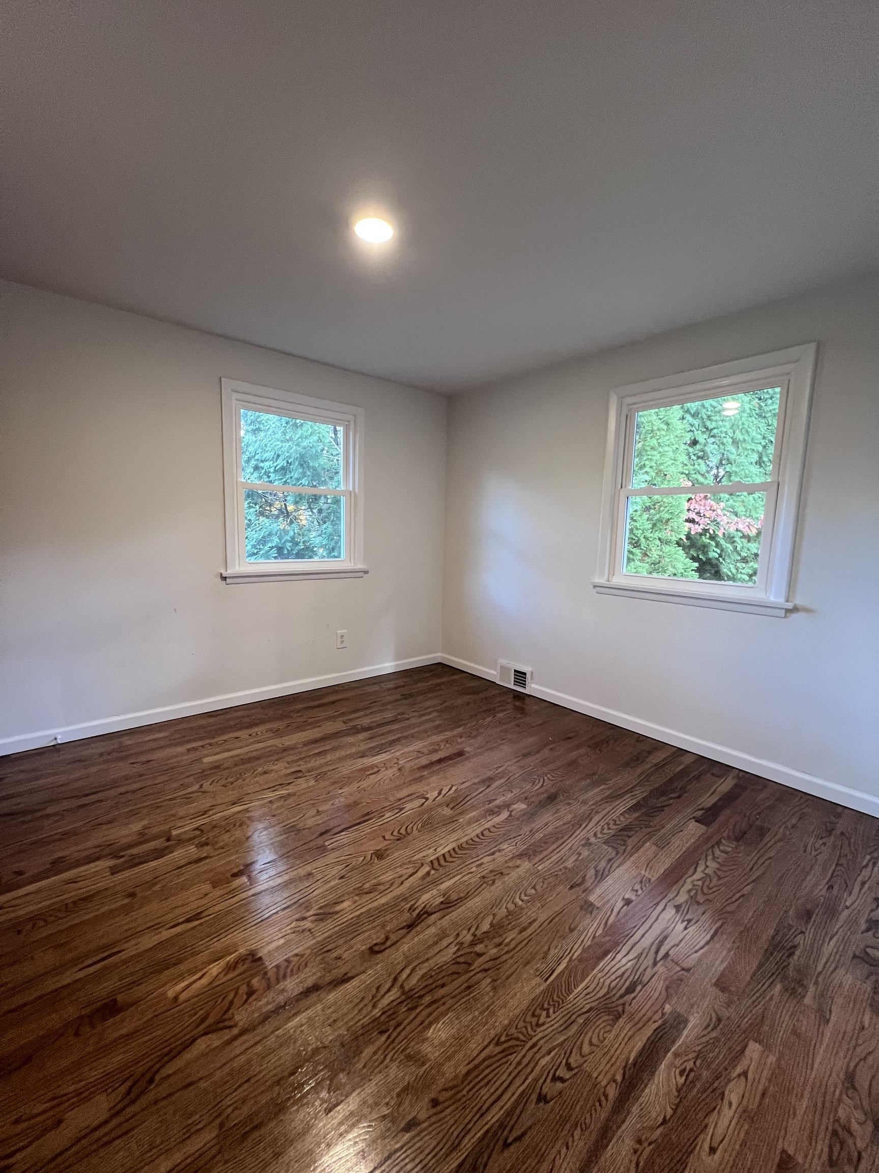 92 Birch Lane Naugatuck, CT 06770 - Photo 11 of 17 a view of empty room with wooden floor and fan