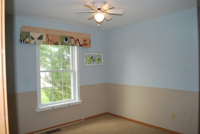 126 Windward Lane Rochelle, IL 61068 - Photo 12 of 25 a view of an empty room with a window