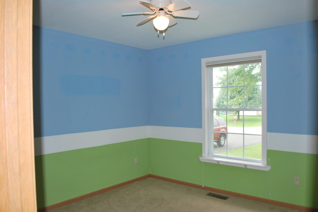 126 Windward Lane Rochelle, IL 61068 - Photo 13 of 25 a room with a window and a ceiling fan