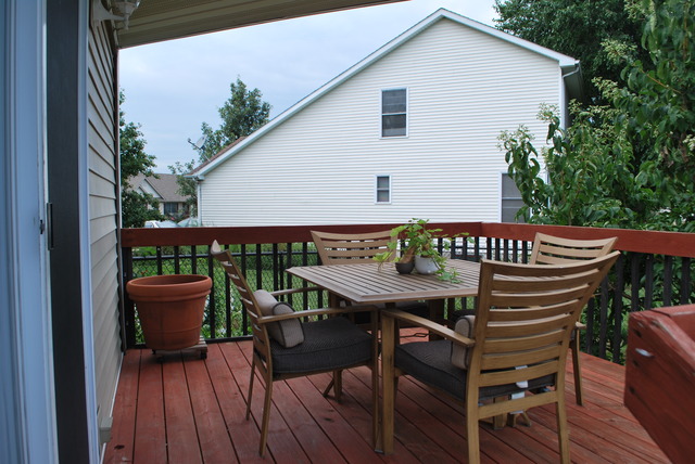 126 Windward Lane Rochelle, IL 61068 - Photo 23 of 25 a view of a chairs and table in the balcony