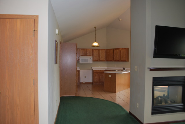 126 Windward Lane Rochelle, IL 61068 - Photo 25 of 25 a view of a kitchen with a sink and a refrigerator