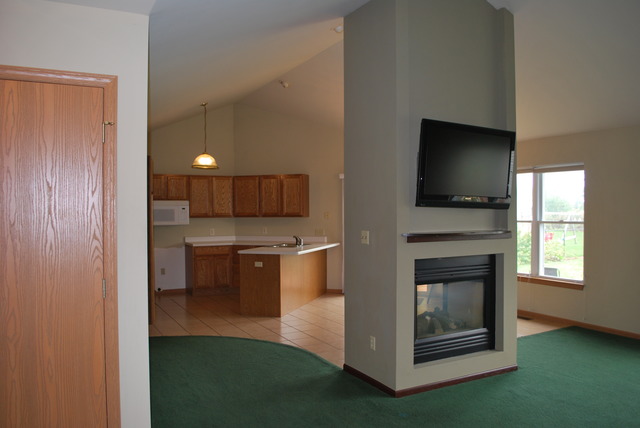 126 Windward Lane Rochelle, IL 61068 - Photo 5 of 25 a kitchen view with table and stove
