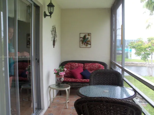 a view of swimming pool from a balcony