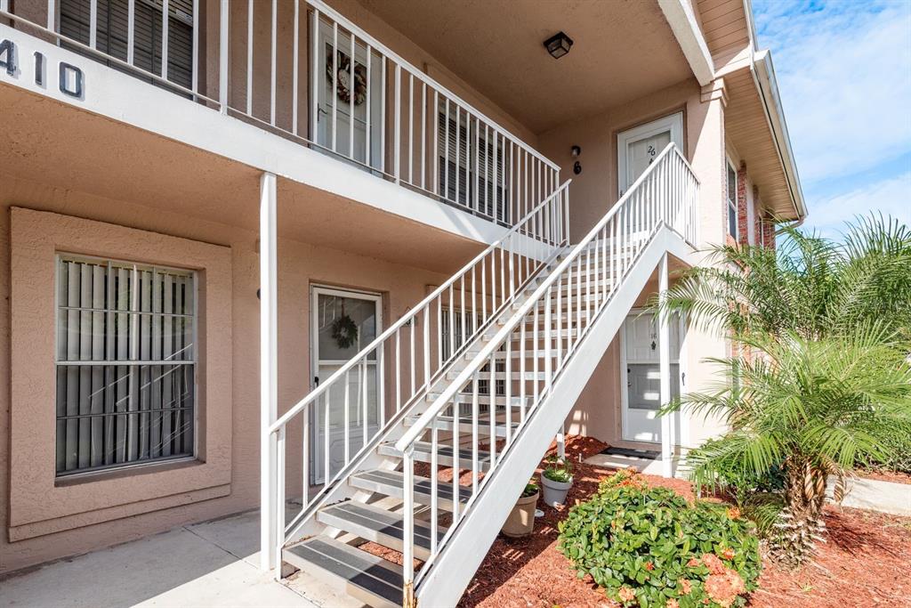 6410 Spring Flower Drive, Unit 26 New Port Richey, FL 34653 - Photo 11 of 38 front view of a house with balcony
