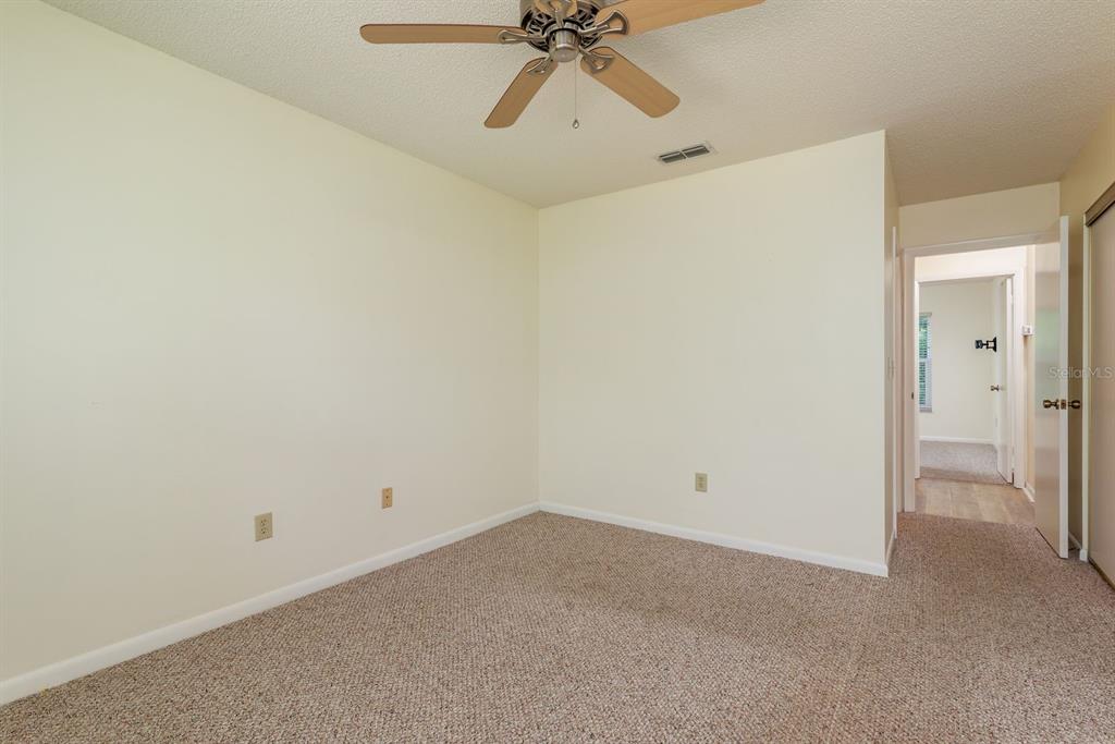 6410 Spring Flower Drive, Unit 26 New Port Richey, FL 34653 - Photo 20 of 38 a view of an empty room