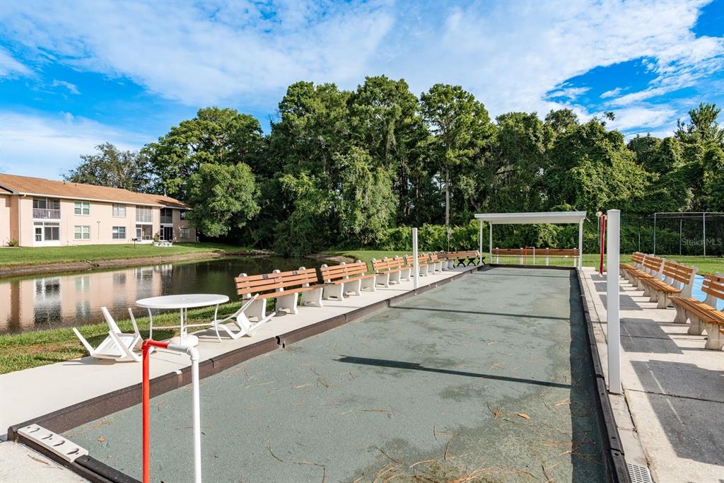 6410 Spring Flower Drive, Unit 26 New Port Richey, FL 34653 - Photo 31 of 38 a view of a balcony with chairs