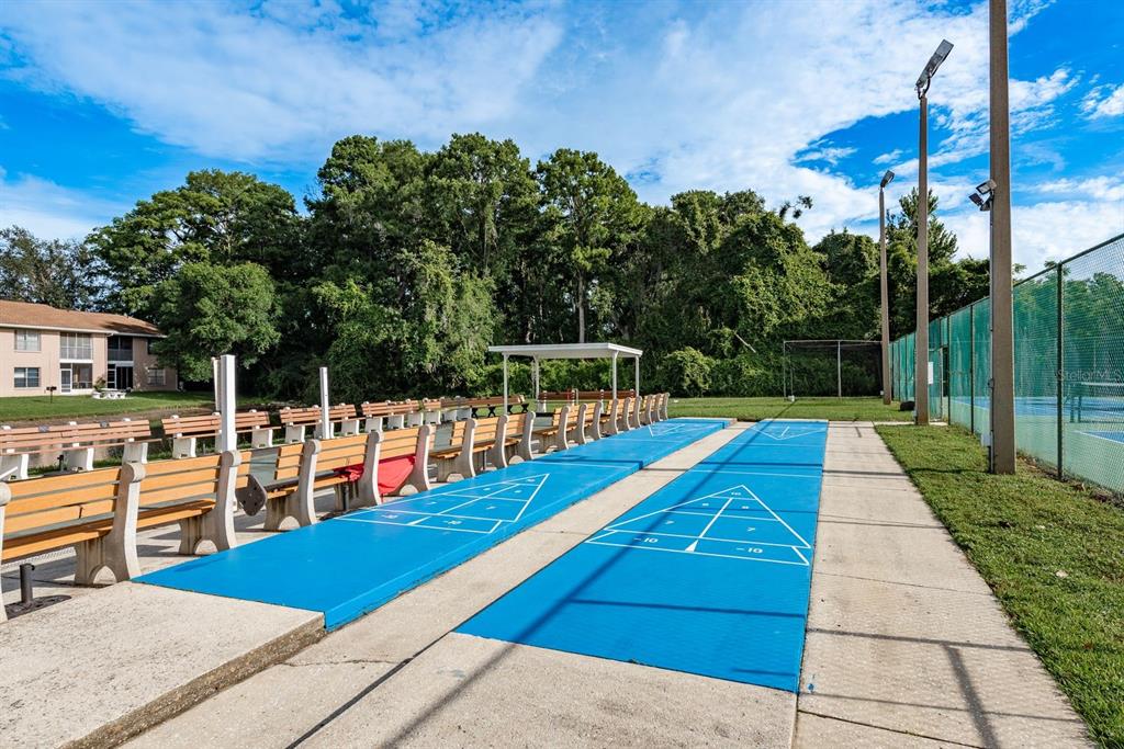 6410 Spring Flower Drive, Unit 26 New Port Richey, FL 34653 - Photo 32 of 38 a view of yard with swimming pool