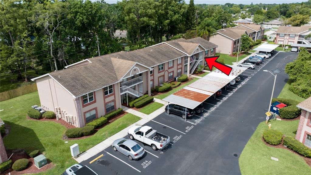 6410 Spring Flower Drive, Unit 26 New Port Richey, FL 34653 - Photo 35 of 38 an aerial view of a house