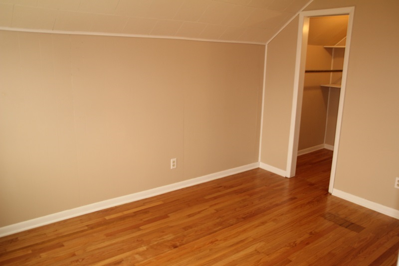 7685 Edson Road Capron, IL 61012 - Photo 15 of 23 a view of an empty room with wooden floor and a window