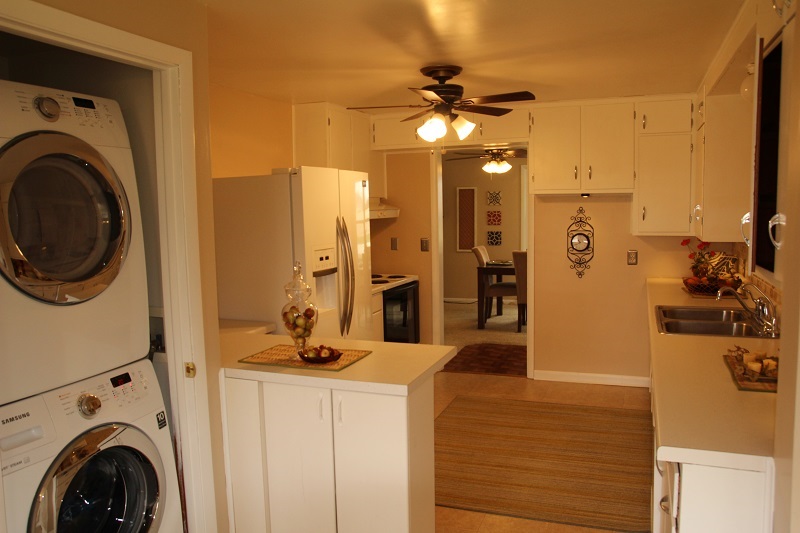 7685 Edson Road Capron, IL 61012 - Photo 3 of 23 a view of a kitchen with a sink washer and dryer
