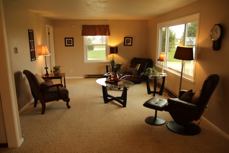 7685 Edson Road Capron, IL 61012 - Photo 9 of 23 a living room with furniture and a window