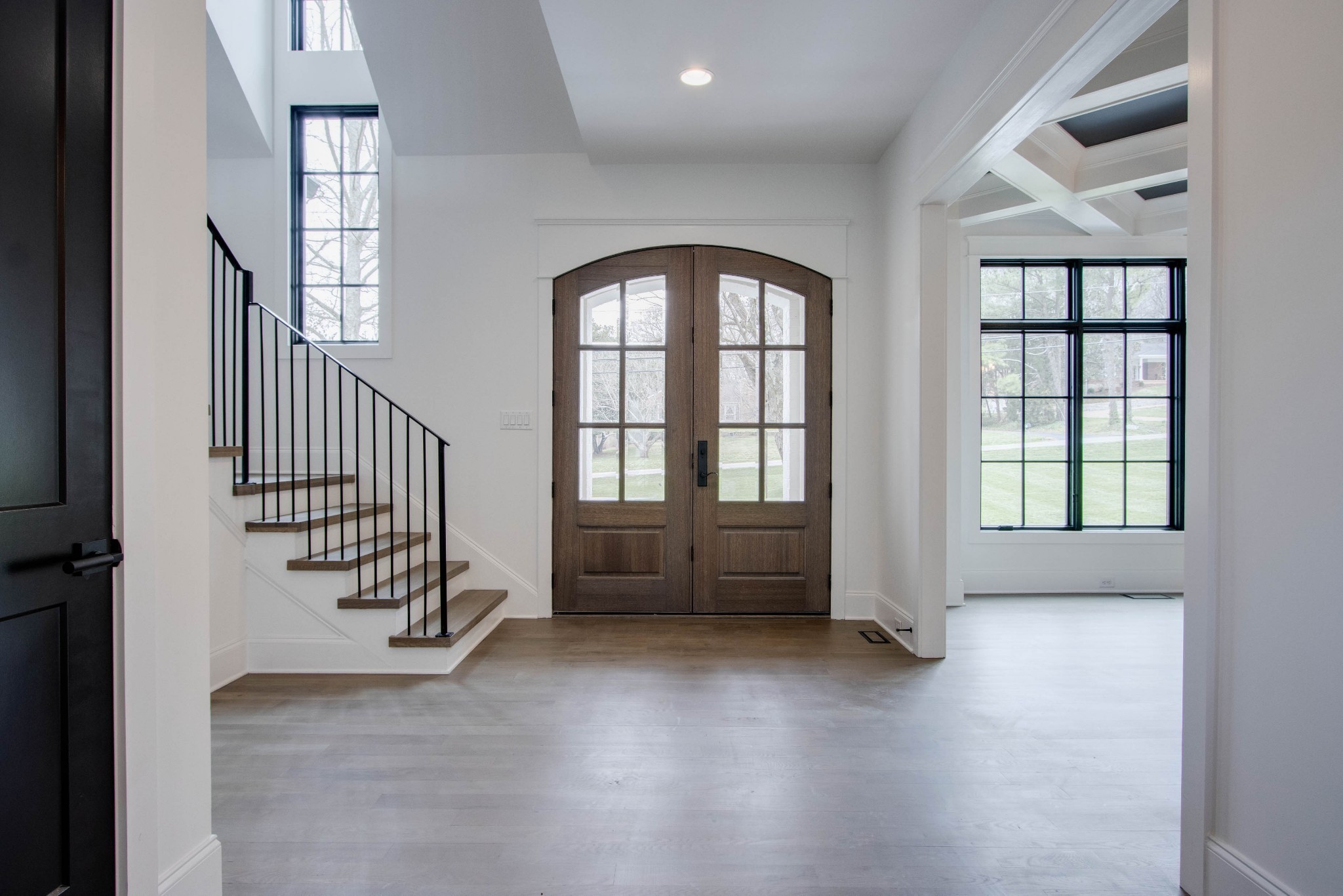 1300 Harding Place Nashville, TN 37215 - Photo 12 of 68 an empty room with wooden floor and windows