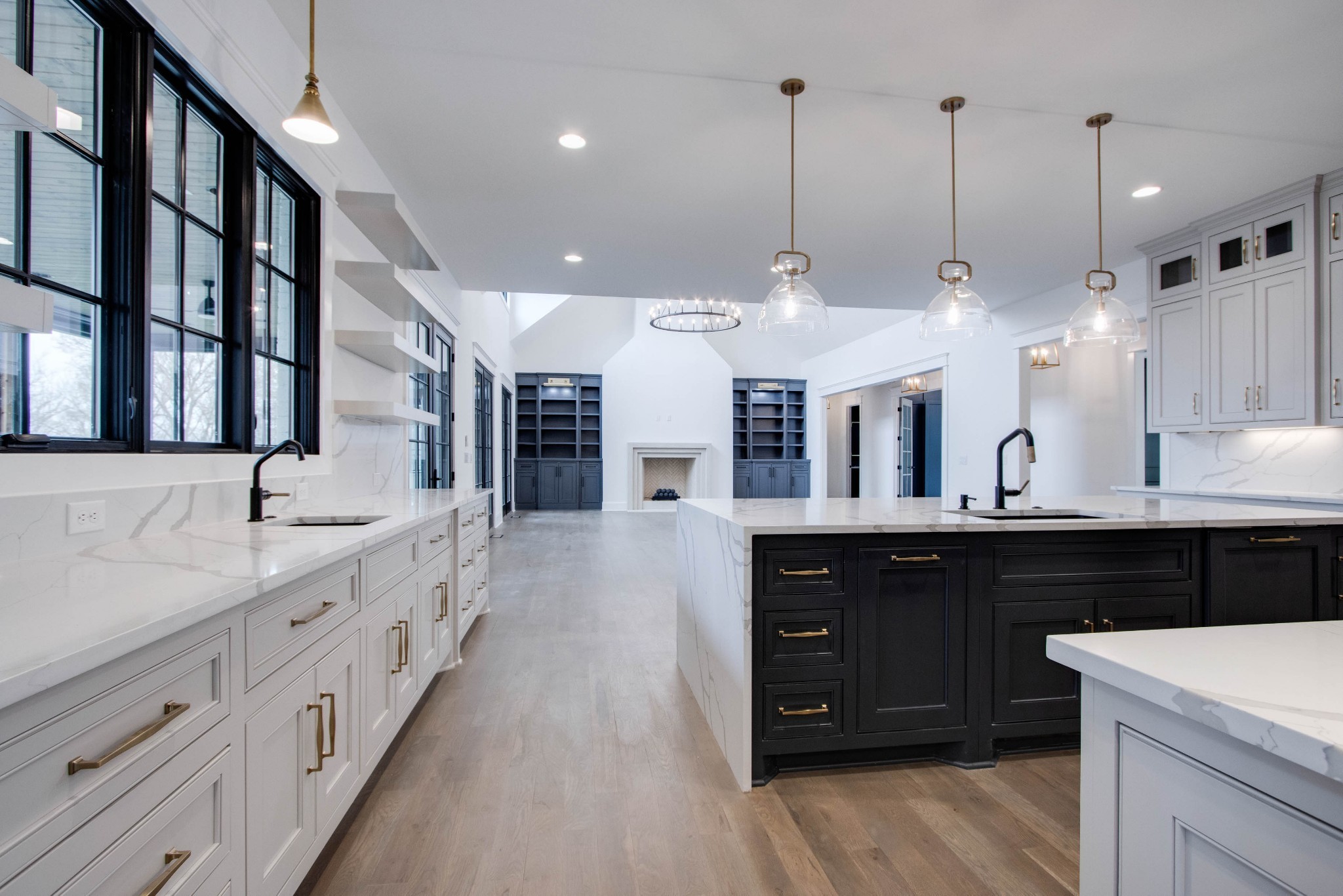 1300 Harding Place Nashville, TN 37215 - Photo 21 of 68 a large kitchen with stainless steel appliances kitchen island granite countertop a large stove a sink dishwasher and a wooden cabinets with wooden floor