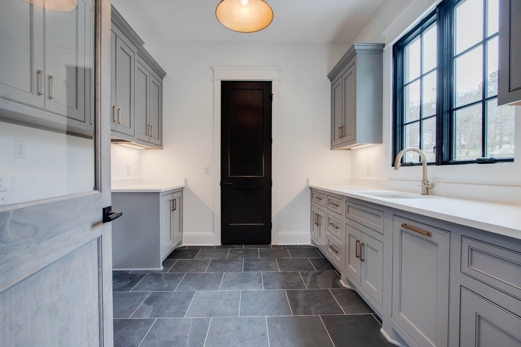 1300 Harding Place Nashville, TN 37215 - Photo 28 of 68 a bathroom with a double vanity sink and a mirror