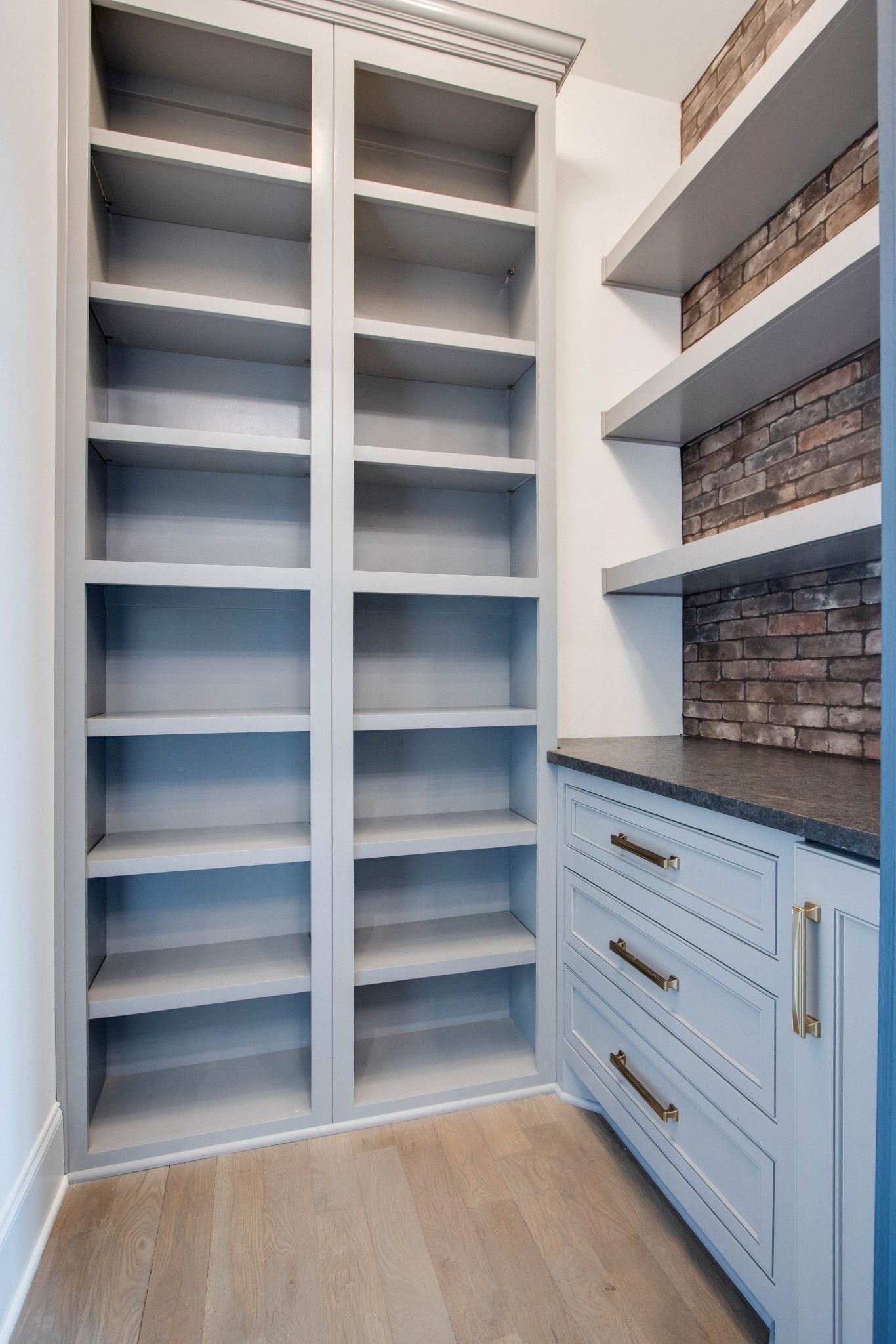 1300 Harding Place Nashville, TN 37215 - Photo 36 of 68 a view of walk in closet with empty racks