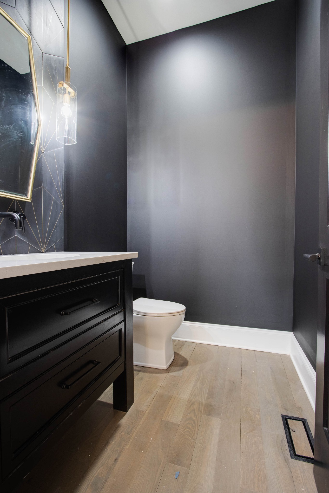 1300 Harding Place Nashville, TN 37215 - Photo 38 of 68 a bathroom with a sink a toilet and a mirror