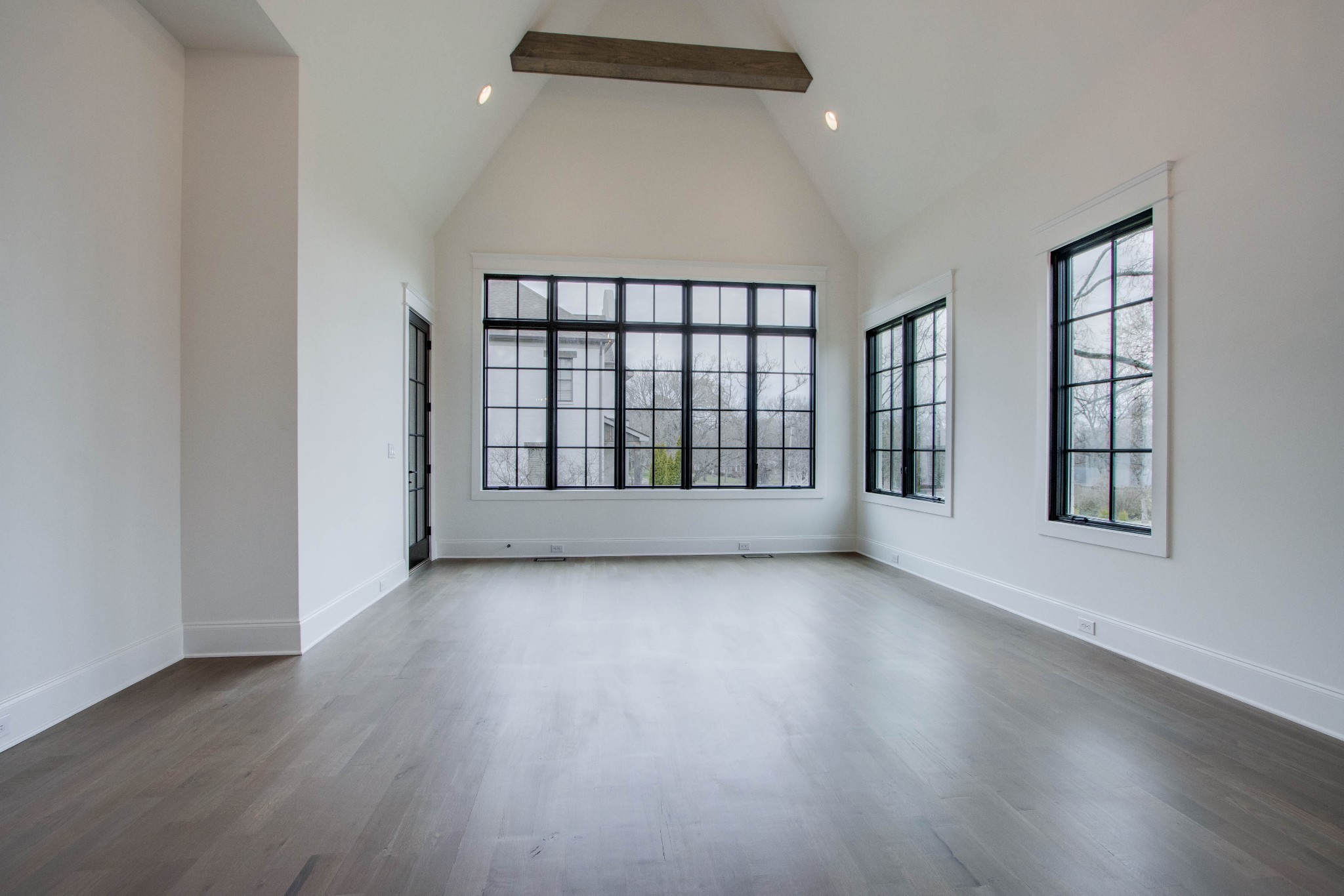 1300 Harding Place Nashville, TN 37215 - Photo 40 of 68 wooden floor in an empty room with a window