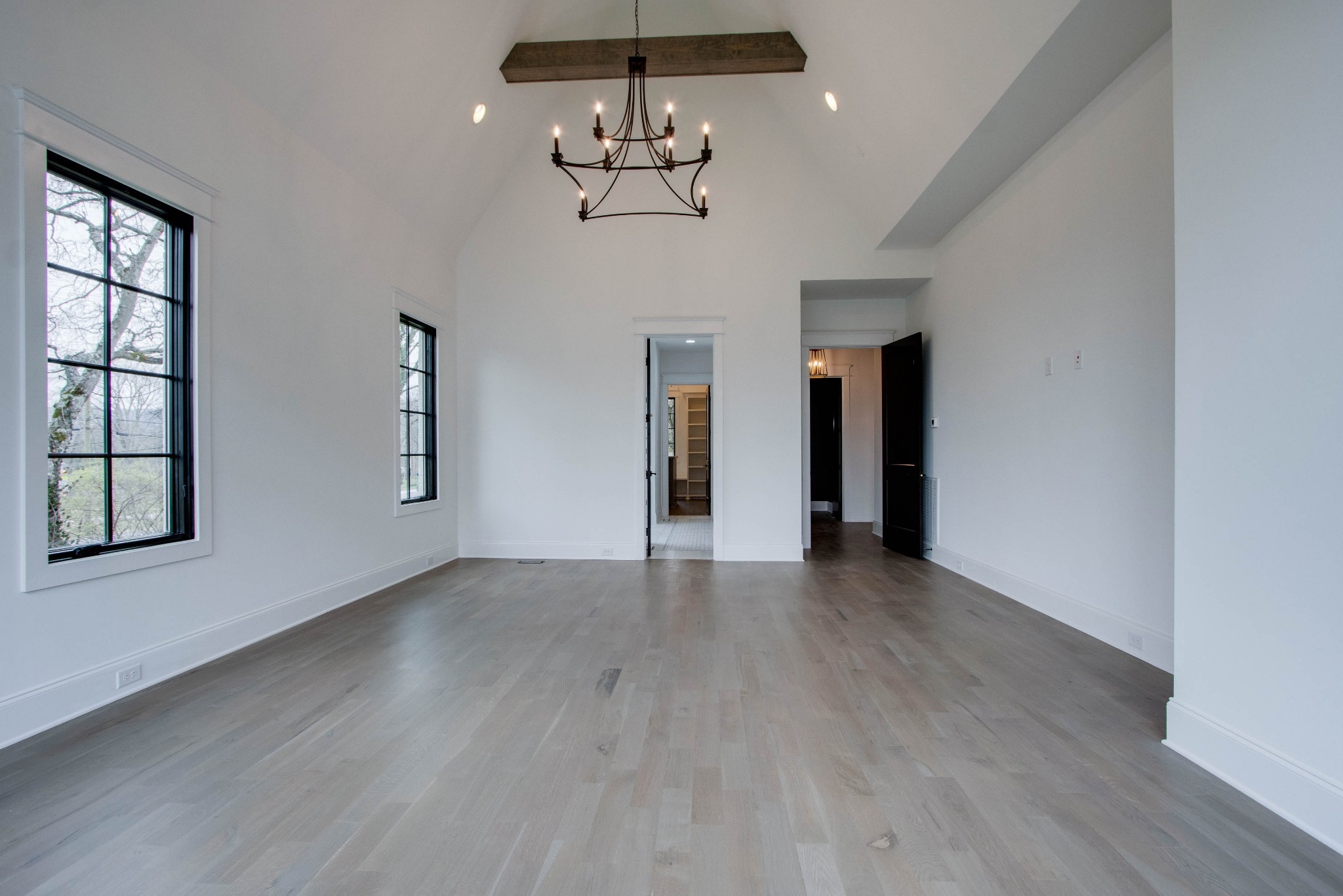 1300 Harding Place Nashville, TN 37215 - Photo 41 of 68 a view of a room with wooden floor chandelier and windows