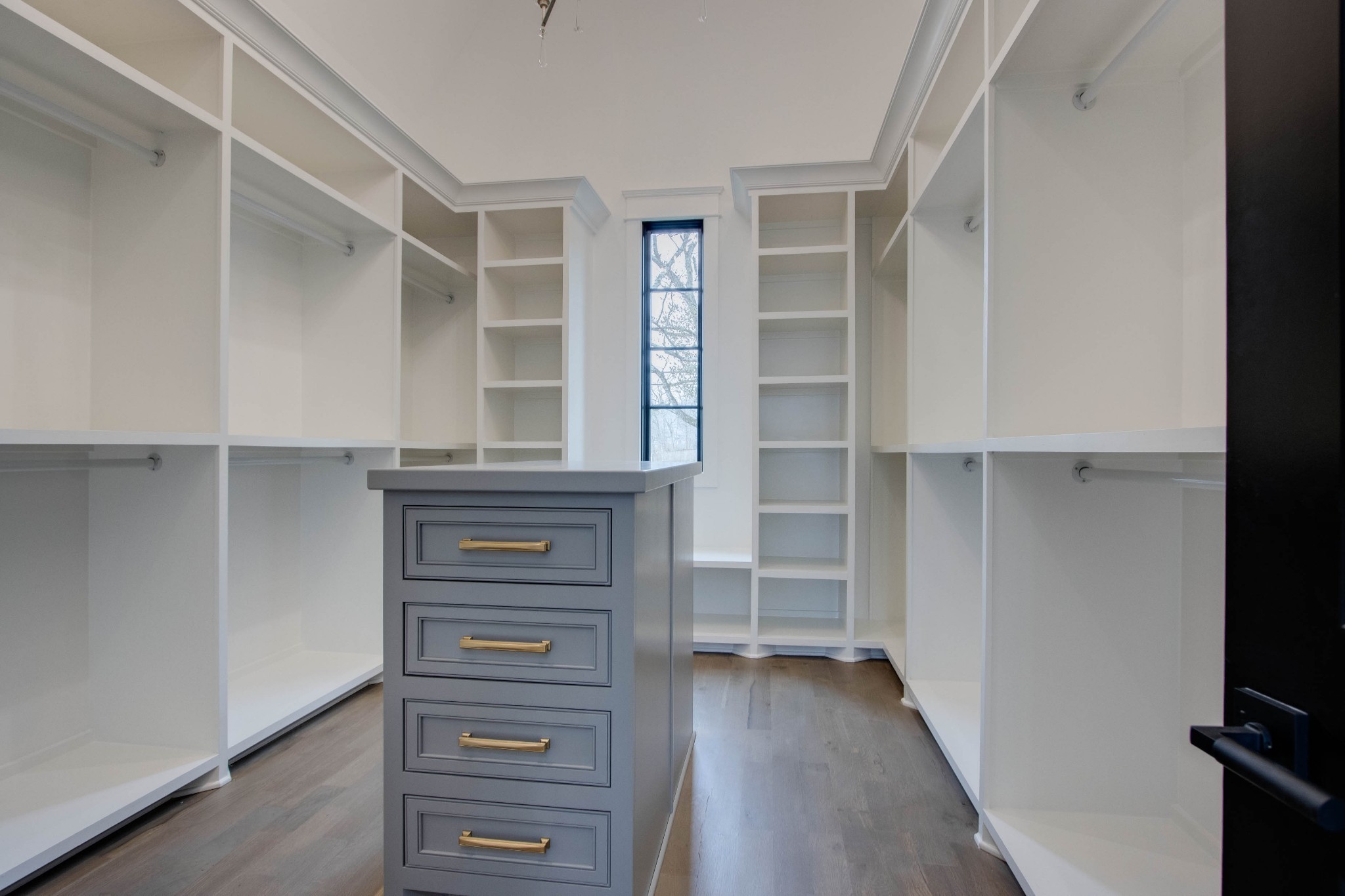 1300 Harding Place Nashville, TN 37215 - Photo 42 of 68 a view of walk in closet with empty racks