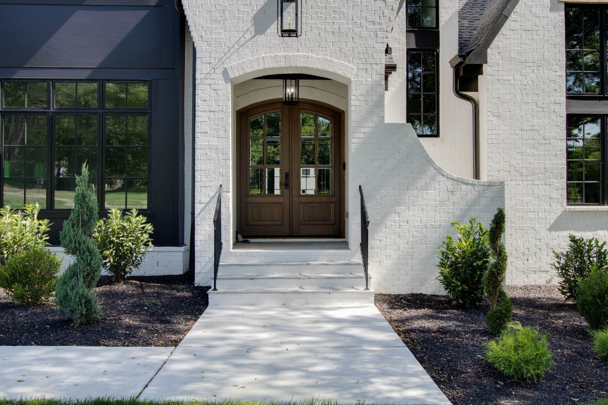 1300 Harding Place Nashville, TN 37215 - Photo 5 of 68 a front view of a house with a porch