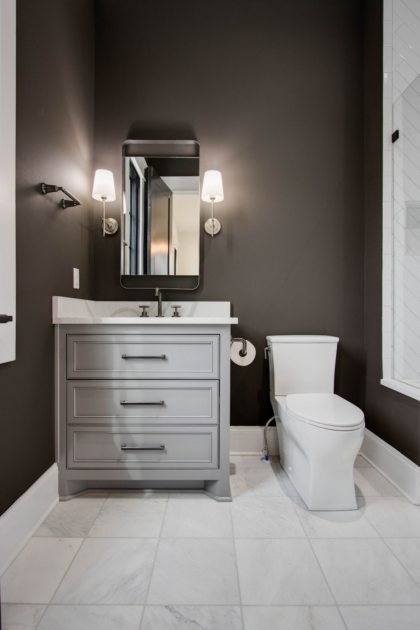 1300 Harding Place Nashville, TN 37215 - Photo 51 of 68 a bathroom with a toilet sink and mirror
