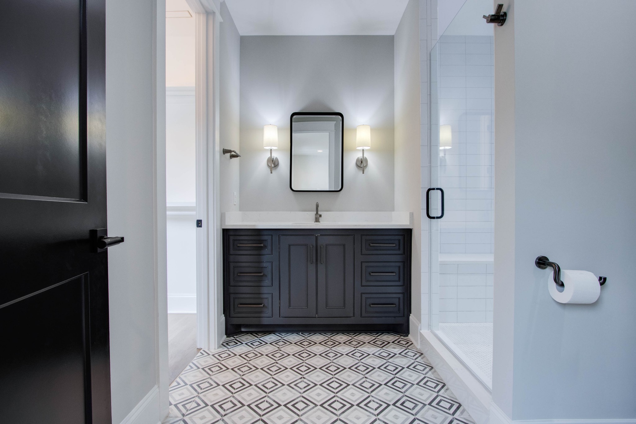 1300 Harding Place Nashville, TN 37215 - Photo 57 of 68 a bathroom with a mirror and a sink