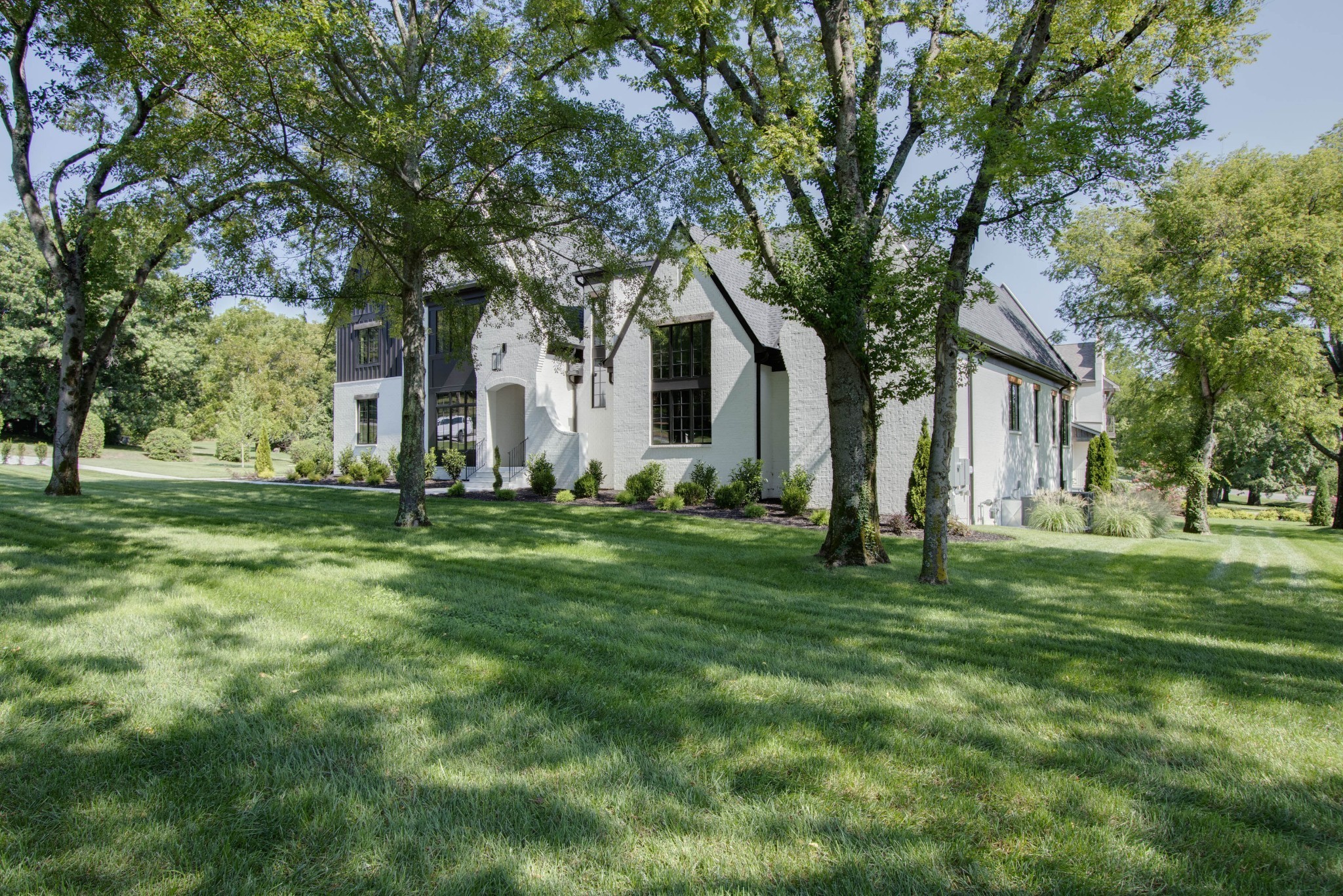 1300 Harding Place Nashville, TN 37215 - Photo 6 of 68 a front view of house with yard and green space