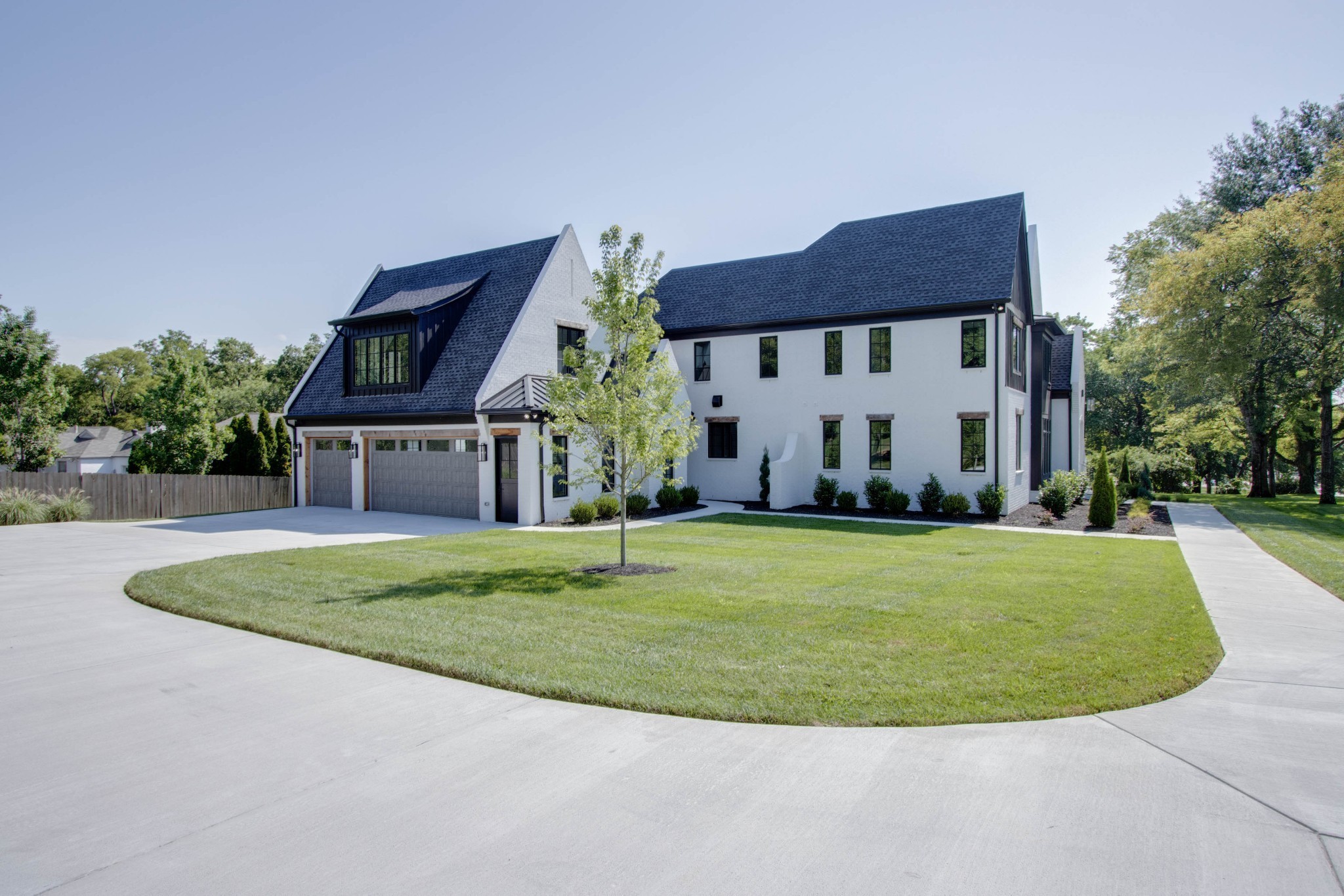1300 Harding Place Nashville, TN 37215 - Photo 8 of 68 a view of a house with a backyard