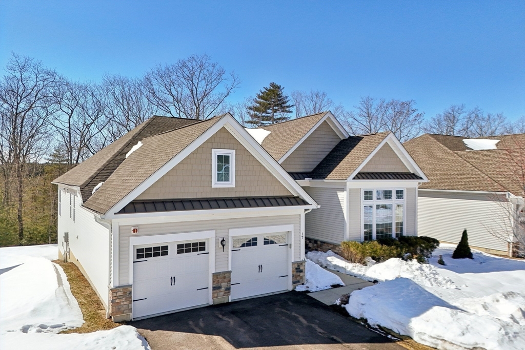 17 West View Lane, Unit 17 Stow, MA 01775 - Photo 17 of 32 a view of a house with a yard