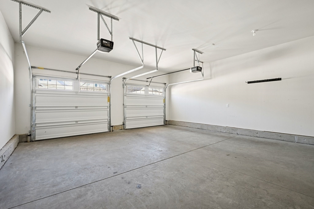 17 West View Lane, Unit 17 Stow, MA 01775 - Photo 24 of 32 a view of a garage