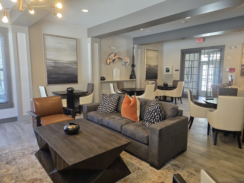 17 West View Lane, Unit 17 Stow, MA 01775 - Photo 28 of 32 a living room with furniture