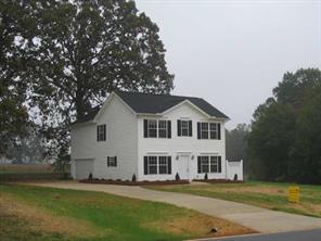 2903 New Salem Road Monroe, NC 28110 - Photo 1 of 8 a front view of a house with a garden