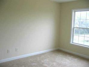2903 New Salem Road Monroe, NC 28110 - Photo 5 of 8 an empty room with a window