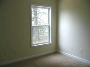 2903 New Salem Road Monroe, NC 28110 - Photo 7 of 8 an empty room with a window