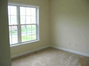 2903 New Salem Road Monroe, NC 28110 - Photo 8 of 8 an empty room with a window
