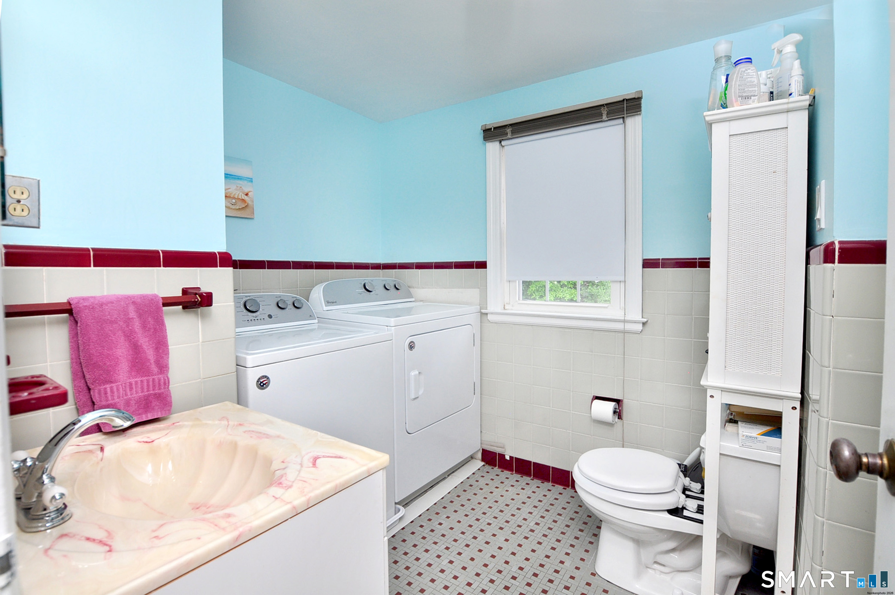 16 Miamis Road West Hartford, CT 06117 - Photo 30 of 39 Primary bathroom includes laundry area and separate shower.