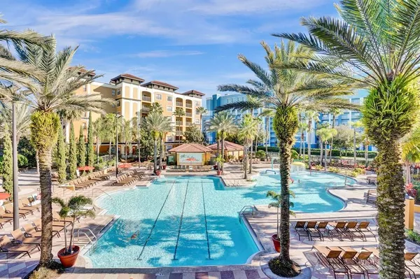 a view of a backyard with a patio