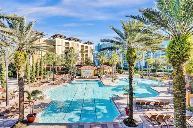 a view of a backyard with a patio