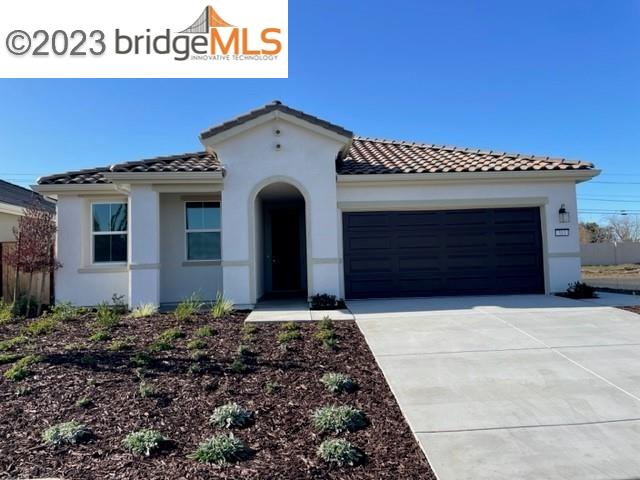 313 Orso Way Oakley, CA 94561 - Photo 1 of 1 a front view of a house with garage